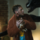 Venom faces off with Tom Hardy (and a chicken) in Venom: Let There Be Carnage.